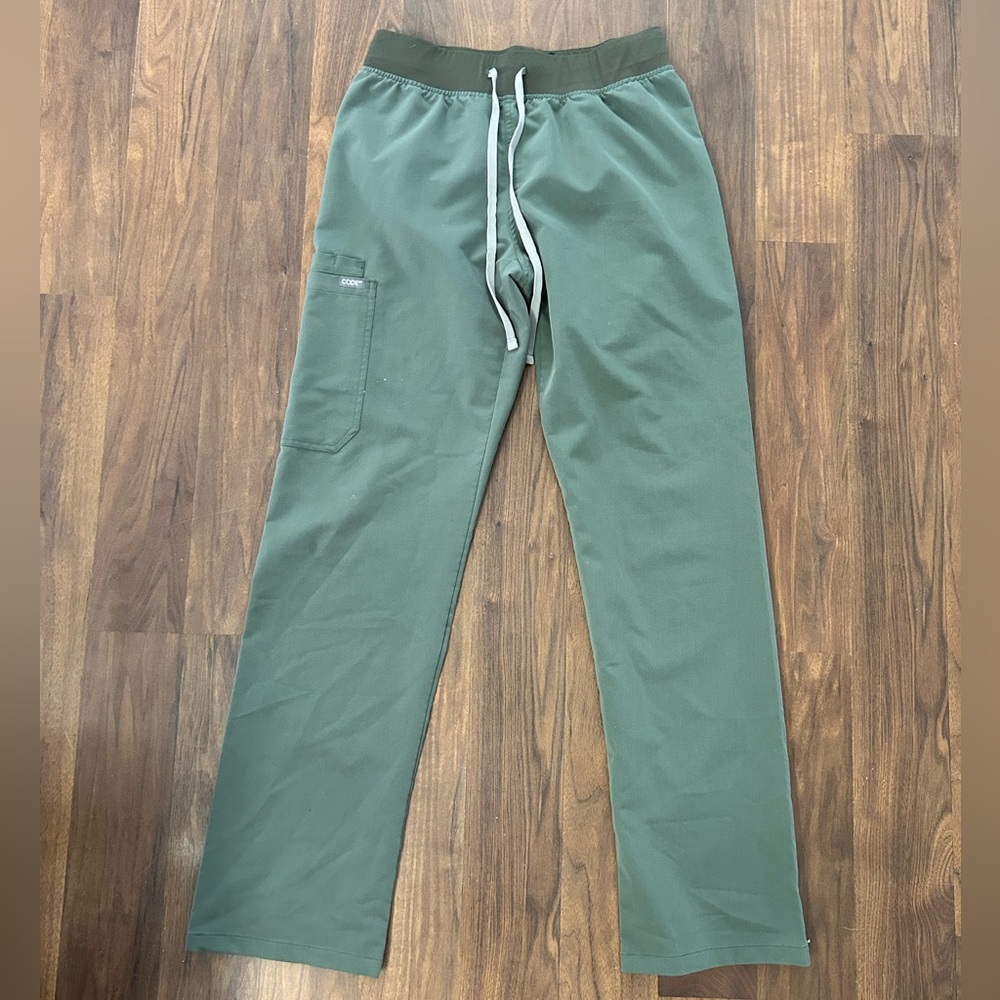 Green code nxt scrub pants